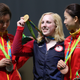 Virginia Thrasher, center, of the United States holds her gold medal for the Women's 10m Air Rifle competition during the award ceremony with the runner-up Du li, left, of China and third place Yi Siling, right, of China at Olympic Shooting Center at the 2016 Summer Olympics in Rio de Janeiro, Brazil, Saturday, Aug. 6, 2016. ()